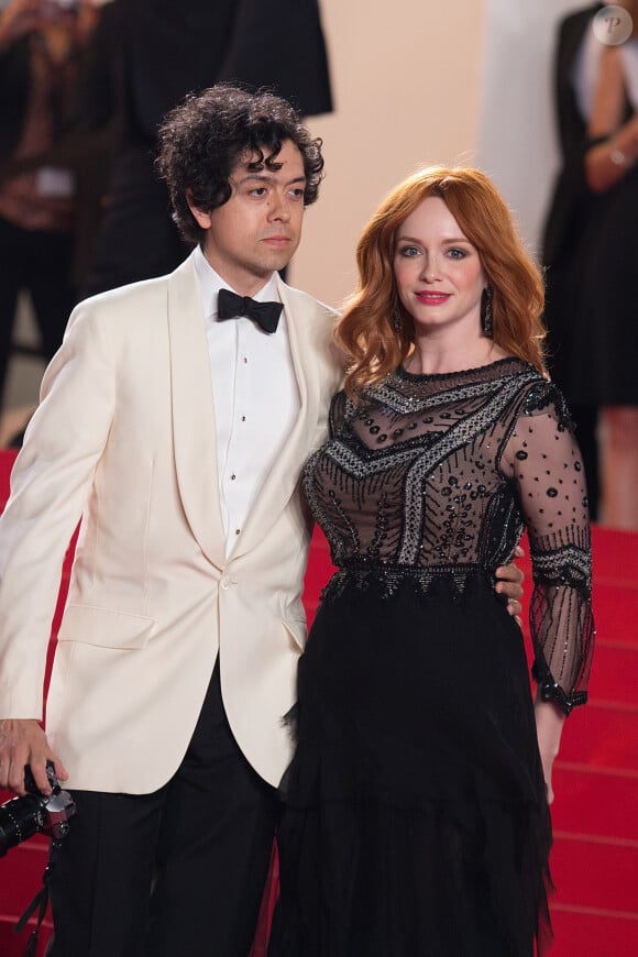 Geoffrey Arend et Christina Hendricks - Montée des marches du film "Coming Home" lors du 67e Festival du film de Cannes le 20 mai 2014.