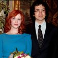  Christina Hendricks et son mari Geoffrey Arend à Paris en février 2011 lors de la remise de la médaille de la Ville de Paris à Matthew Weiner, créateur de la série Mad Men. 
