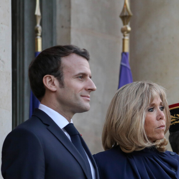 Le président Emmanuel Macron, la première dame Brigitte Macron - Le président de la République française et sa femme accueillent le roi et la reine de Jordanie au palais de l'Elysée à Paris le 29 mars 2019. © Stéphane Lemouton / Bestimage