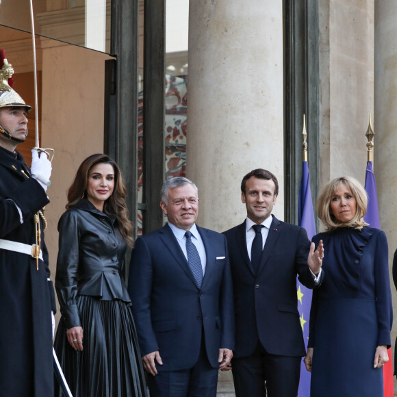 Le président Emmanuel Macron, la première dame Brigitte Macron - Le président de la République française et sa femme accueillent le roi et la reine de Jordanie au palais de l'Elysée à Paris le 29 mars 2019. © Stéphane Lemouton / Bestimage