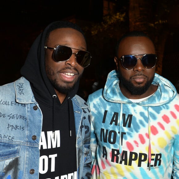 Dadju (Dadju Djuna Nsungula), son frère le rappeur Gims (Maître Gims - Gandhi Djuna) et Djibril Cissé lors de la soirée de lancement de la collection capsule "I'm not a rapper" de la marque Elevenparis (Eleven Paris) à Paris, France, le 11 avril 2019. © Veeren/Bestimage