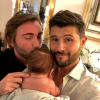 Christophe Beaugrand, son mari Ghislain et leur fils Valentin. Décembre 2019