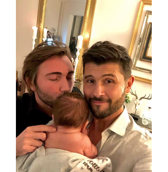 Christophe Beaugrand, son mari Ghislain et leur fils Valentin. Décembre 2019