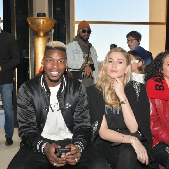 Paul Pogba et sa femme Maria au défilé Amiri lors de la Fashion Week Homme de Paris, automne/hiver 2020-2021 le 16 janvier 2020.