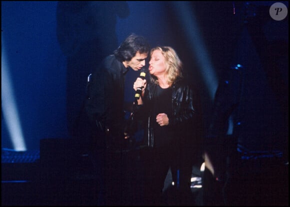 Jean-Jacques Goldman et Véronique Sanson lors de la tournée des Enfoirés en 1989.