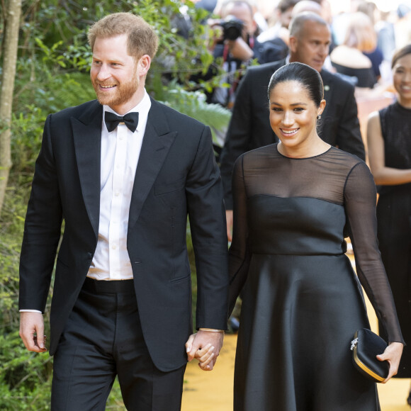 Le prince Harry, duc de Sussex, et Meghan Markle, duchesse de Sussex, à la première du film "Le Roi Lion" au cinéma Odeon Luxe Leicester Square à Londres, le 14 juillet 2019.