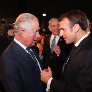 Le prince Charles et Emmanuel Macron lors de la cérémonie marquant à Jérusalem le 75e anniversaire de la libération du camp nazi d'Auschwitz, le 23 janvier 2020, au Mémorial de Yad Vashem.