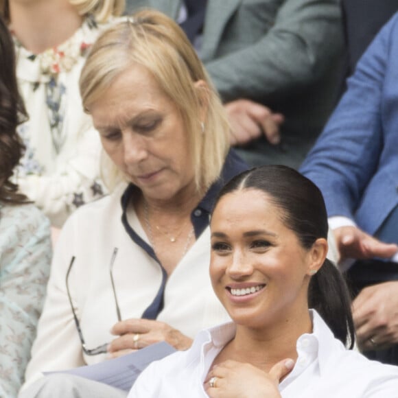 Kate Middleton, duchesse de Cambridge, Meghan Markle, duchesse de Sussex, et Pippa Middleton dans les tribunes lors de la finale femme de Wimbledon "Serena Williams - Simona Halep (2/6 - 2/6) à Londres, le 13 juillet 2019.