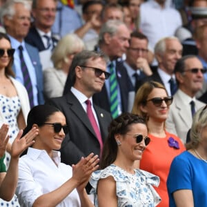 Catherine (Kate) Middleton, duchesse de Cambridge, Meghan Markle, duchesse de Sussex, et Pippa Middleton dans les tribunes lors de la finale femme de Wimbledon "Serena Williams - Simona Halep (2/6 - 2/6) à Londres, le 13 juillet 2019.