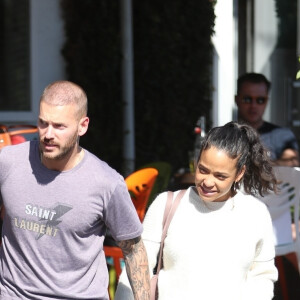 Matt Pokora et sa compagne Christina Milian se baladent avec leur fils Isaiah dans le quartier de West Hollywood à Los Angeles. La petite famille est allée déjeuner chez Fred Segal. Le 11 février 2020