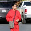 Exclusif - Christina Milian enceinte porte un jogging rouge et un sac Gucci à son arrivée à son Beignet Box truck dans le quartier de Studio City à Los Angeles, le 15 décembre 2019