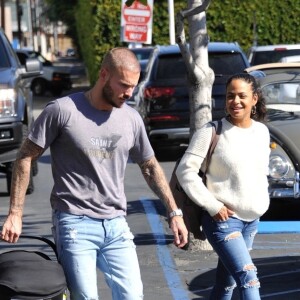 Matt Pokora et sa compagne Christina Milian se baladent avec leur fils Isaiah dans le quartier de West Hollywood à Los Angeles. La petite famille est allée déjeuner chez Fred Segal. Le 11 février 2020  Christina Milian and her rapper boyfriend Matt Pokora bring their newborn little one with them for lunch at Fred Segal in West Hollywood. Matt carried his newborn child in a carrier as Christina hugs a friend goodbye. 11th february 202011/02/2020 - Los Angeles