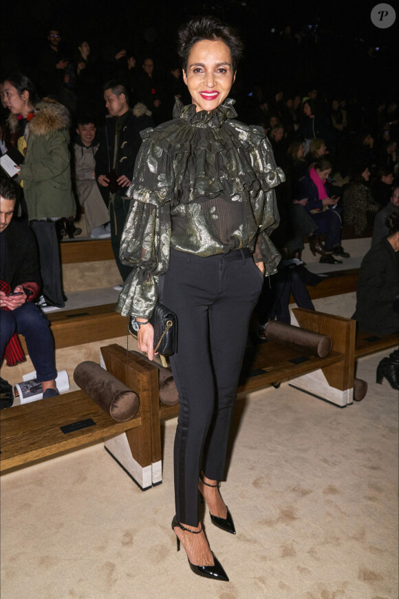 Farida Khelfa assiste au défilé de mode Saint Laurent, collection prêt-à-porter automne-hiver 2020/2021, à la Tour Eiffel. Paris, le 25 février 2020.