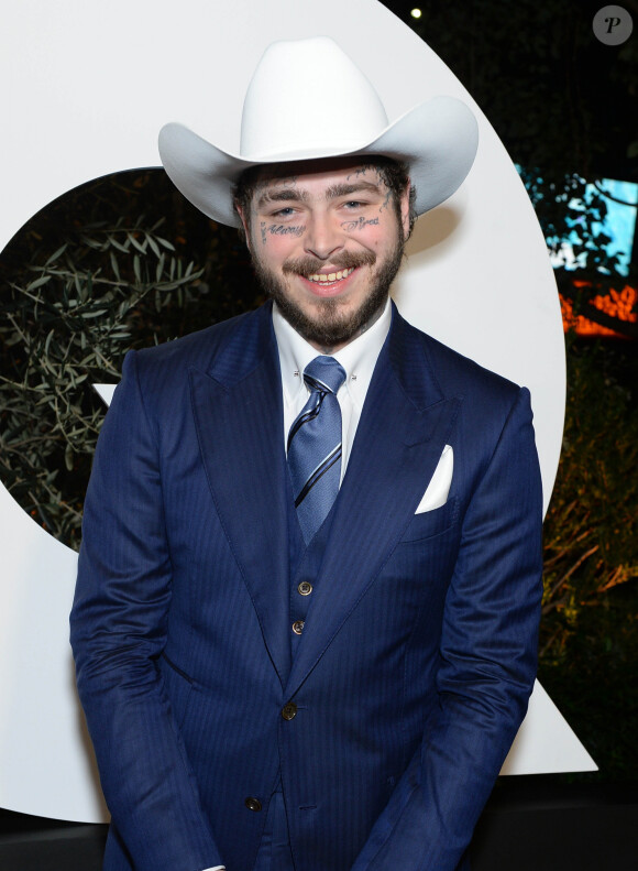 Post Malone au photocall de la soirée des "GQ Men of the Year 2019" à Los Angeles, le 5 décembre 2019.