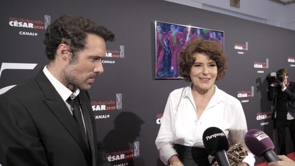 Fanny Ardant et Nicolas Bedos au micro de Purepeople.com après leur sacre aux César 2020, le 28 février 2020.