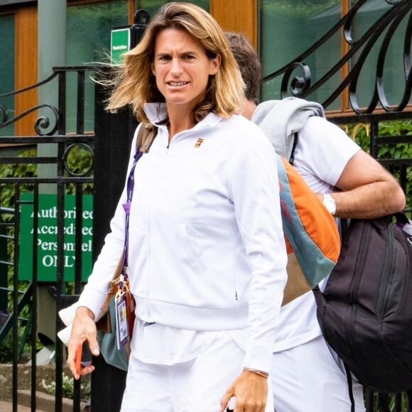 Exclusif - Amélie Mauresmo et Lucas Pouille à la sortie de leur entrainement lors du tournoi de tennis de Wimbledon à Londres. Le 26 juin 2019.