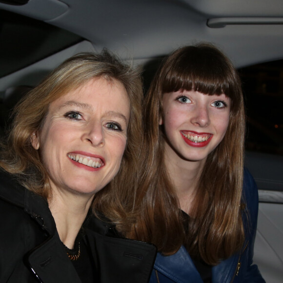 Karin Viard et sa fille Simone Machuel - Arrivées des people au défilé de mode, collection prêt-à-porter automne-hiver 2014/2015 "Paul & Joe" à Paris. Le 4 mars 2014