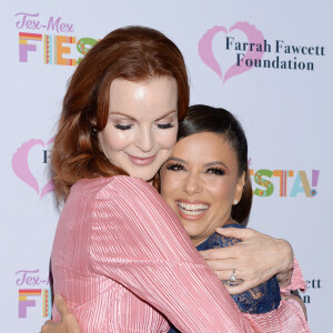 Marcia Cross et Eva Longoria au photocall du gala caritatif "Farrah Fawcett Foundation" au Wallis Annenberg Center for the Performing Arts à Los Angeles, le 6 septembre 2019.