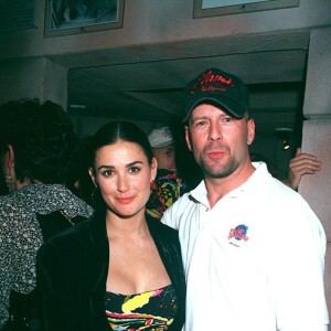 Bruce Willis et Demi Moore à Disneyland Orlando en 1994.