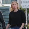 Exclusif - Main dans la main, Amber Heard et sa présumée compagne Bianca Butti à Los Angeles, le 23 mars 2020.