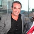 Exclusif - Jean Dujardin, Jean-Paul Belmondo - Soirée de Gala caritative au profit de l'association "Des Cantines Scolaires pour les Enfants du Sahel" à Cannes au Five Seas Hotel, le 31 mai 2014.