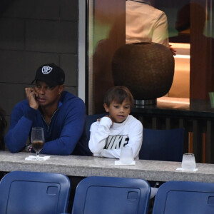 Tiger Woods avec ses enfants Charlie et Sam et sa compagne Erica Herman le 2 septembre 2019 à New York lors de l'US Open.
