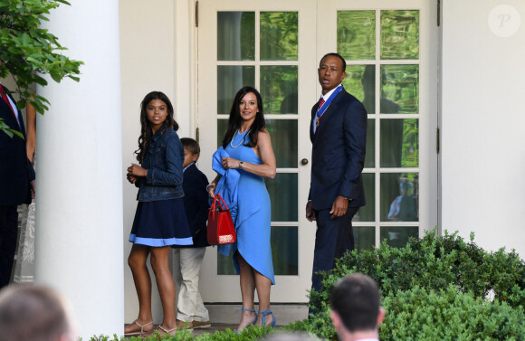 Tiger Woods à la Maison Blanche à Washington en mai 2019, avec ses enfants Sam et Charlie et sa compagne Erica Herman.