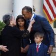 Tiger Woods à la Maison Blanche à Washington en mai 2019, avec ses enfants Sam et Charlie et sa compagne Erica Herman.