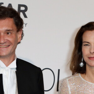 Carole Bouquet et son compagnon Philippe Sereys de Rothschild - Photocall de la soirée "AmfAR's 21st Cinema Against AIDS" à l'Eden Roc au Cap d'Antibes lors du 67ème festival du film de Cannes, le 22 mai 2014.