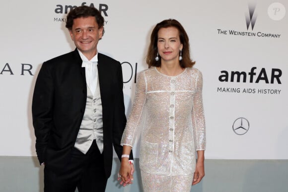 Carole Bouquet et son compagnon Philippe Sereys de Rothschild - Photocall de la soirée "AmfAR's 21st Cinema Against AIDS" à l'Eden Roc au Cap d'Antibes lors du 67ème festival du film de Cannes, le 22 mai 2014.