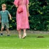 Catherine (Kate) Middleton, duchesse de Cambridge avec ses enfants, le prince George de Cambridge et le prince Louis de Cambridge lors d'un match de polo de bienfaisance King Power Royal Charity Polo Day à Wokinghan, comté de Berkshire, Royaume Uni, le 10 juillet 2019.
