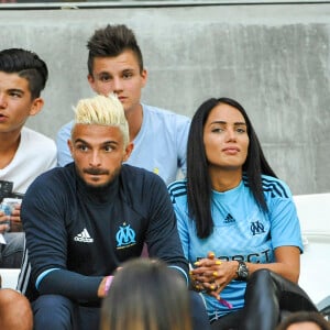 Exclusif - Julien Tanti (Les Marseillais), sa compagne Manon Marsault et un ami dans les tribunes du stade Vélodrome lors du match Olympique de Marseille (OM) à Toulouse Football Club (TFC) à Marseille, le 14 août 2016. © Pierre Pérusseau/Bestimage