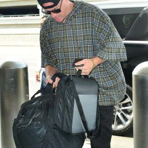 Exclusif - Channing Tatum arrive à l'aéroport de LAX à Los Angeles, le 11 juin 2019.