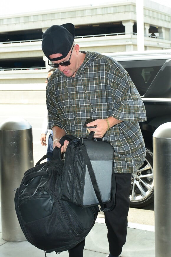 Exclusif - Channing Tatum arrive à l'aéroport de LAX à Los Angeles, le 11 juin 2019.