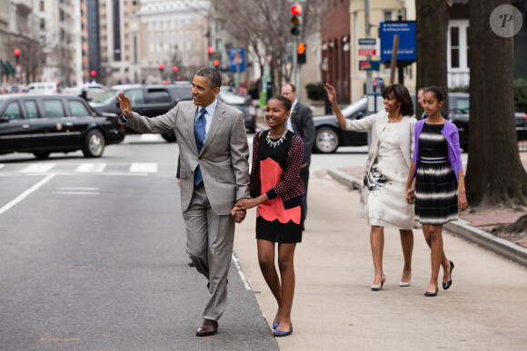 Barack et Michelle Obama avec leurs filles Malia et Sasha à Washington, en 2013.