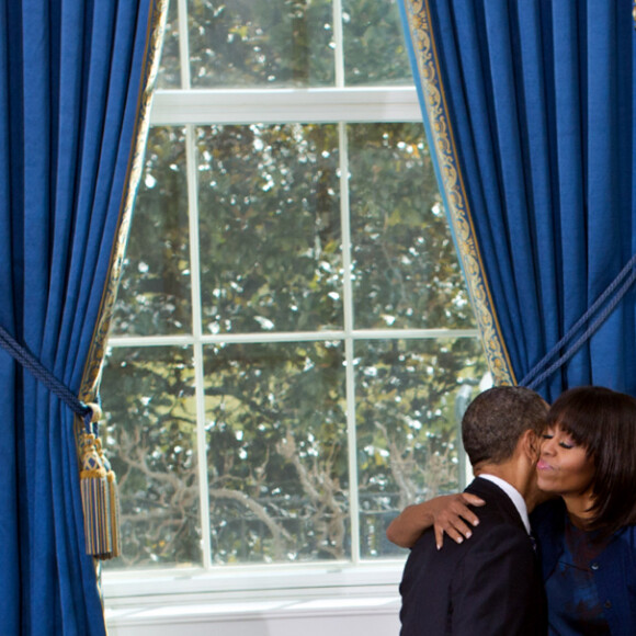 Barack et Michelle Obama avec leurs filles Malia et Sasha à la Maison Blanche en 2013.