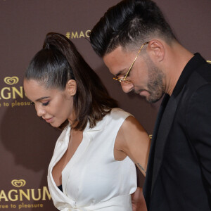 Nabilla Benattia (enceinte) et son mari Thomas Vergara au photocall de l'after party "Magnum x Rita Ora" sur la plage privée Magnum lors du 72ème Festival International du Film de Cannes, France,le 16 mai 2019. © Veeren/Bestimage