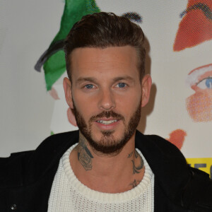 Le chanteur M.Pokora (Matt Pokora) - Début de la tournée des "Pères Noël verts" 2014 à l'occasion des 70 ans du Secours populaire au Palais de l'Unesco à Paris le 8 décembre 2014.