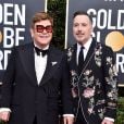 Elton John et son mari David Furnish - Photocall de la 77e cérémonie annuelle des Golden Globe Awards au Beverly Hilton Hotel à Los Angeles, le 5 janvier 2020.