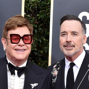 Elton John et son mari David Furnish - Photocall de la 77e cérémonie annuelle des Golden Globe Awards au Beverly Hilton Hotel à Los Angeles, le 5 janvier 2020.