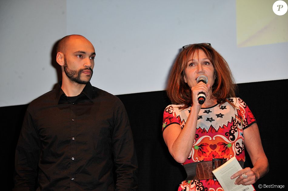 Clémentine Celarie avec son fils Abraham lors du Festival Atmosphere a Courbevoie le 2 Avril 2013.