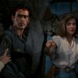 Bruce Campbell, Danny Hicks, Lou Hancock et Sarah Berry dans le film "Evil Dead 2", de Sam Raimi. 1987.