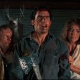 Bruce Campbell, Danny Hicks, Lou Hancock et Sarah Berry dans le film "Evil Dead 2", de Sam Raimi. 1987.