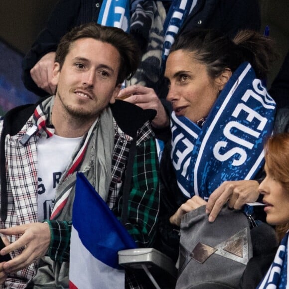 Alessandra Sublet et un ami, Maëva Coucke (Miss France 2018) - People assistent au match des éliminatoires de l'Euro 2020 entre la France et l'Islande au Stade de France à Saint-Denis le 25 mars 2019. La france a remporté le match sur le score de 4-0.