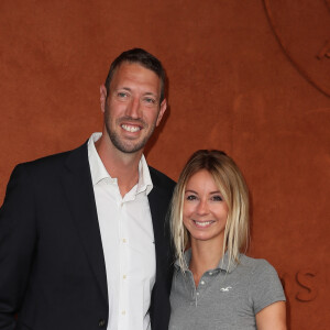 Alain Bernard et sa compagne Faustine au village lors des internationaux de tennis de Roland Garros à Paris, le 10 juin 2018. © Moreau-Jacovides/Bestimage