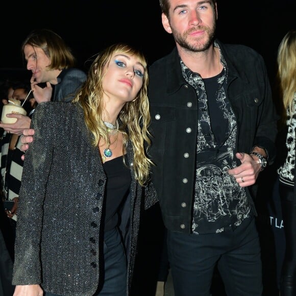 Miley Cyrus et son mari Liam Hemsworth ont été aperçus à la sortie du défilé Saint Laurent à Malibu, le 6 juin 2019