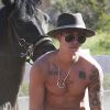 Justin Bieber fait du cheval au Griffith Park à Los Angeles, le 12 mai 2014.