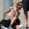Justin Bieber laisse apparaître ses tatouages après un match de football avec ses amis de sa paroisse de Los Angeles le 24 mars 2018. © CPA/Bestimage