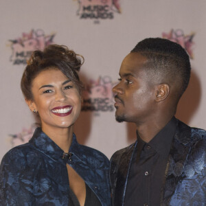 Naissance - Black M et Léa Djadja sont parents pour la 2e fois d'une petite fille prénommée Kiki - Black M (Black Mesrimes) et sa femme Lia - Arrivées à la 17ème cérémonie des NRJ Music Awards 2015 au Palais des Festivals à Cannes, le 7 novembre 2015.