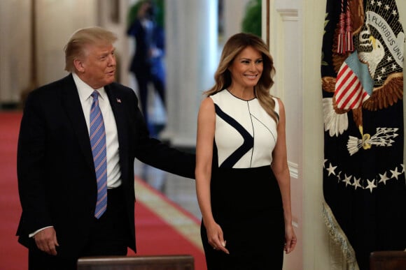 Le président Donald Trump et la première dame Melania lors d'une réunion sur les conditions pour la réouverture des écoles à la Maison Blanche à Washington le 7 juillet 2020. 